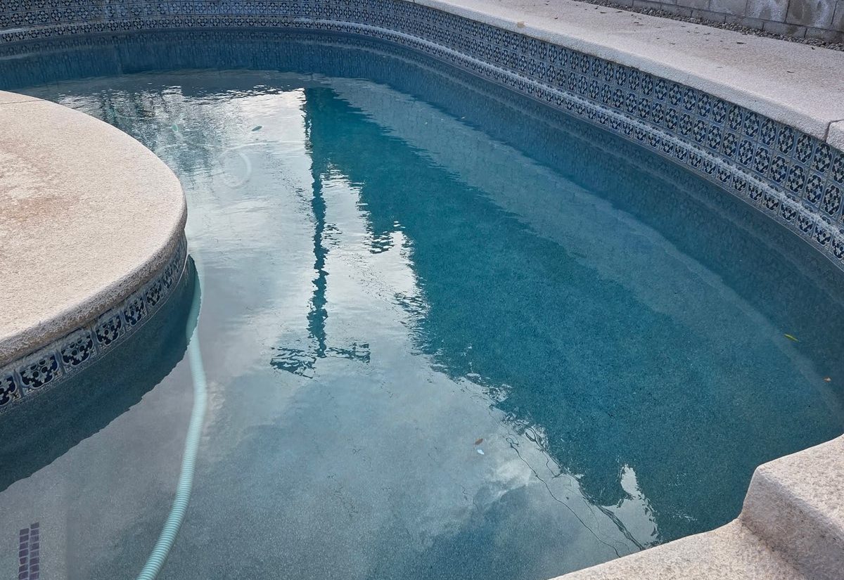 Sparkling clean backyard swimming pool with mountain views, maintained by Aqua Fresh Pool Service in Palm Springs